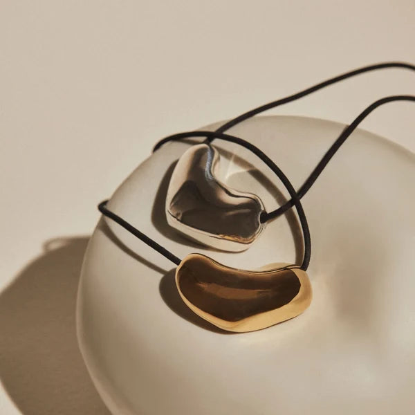 Sculpted Heart Pendant in Sterling Silver / Black Cord