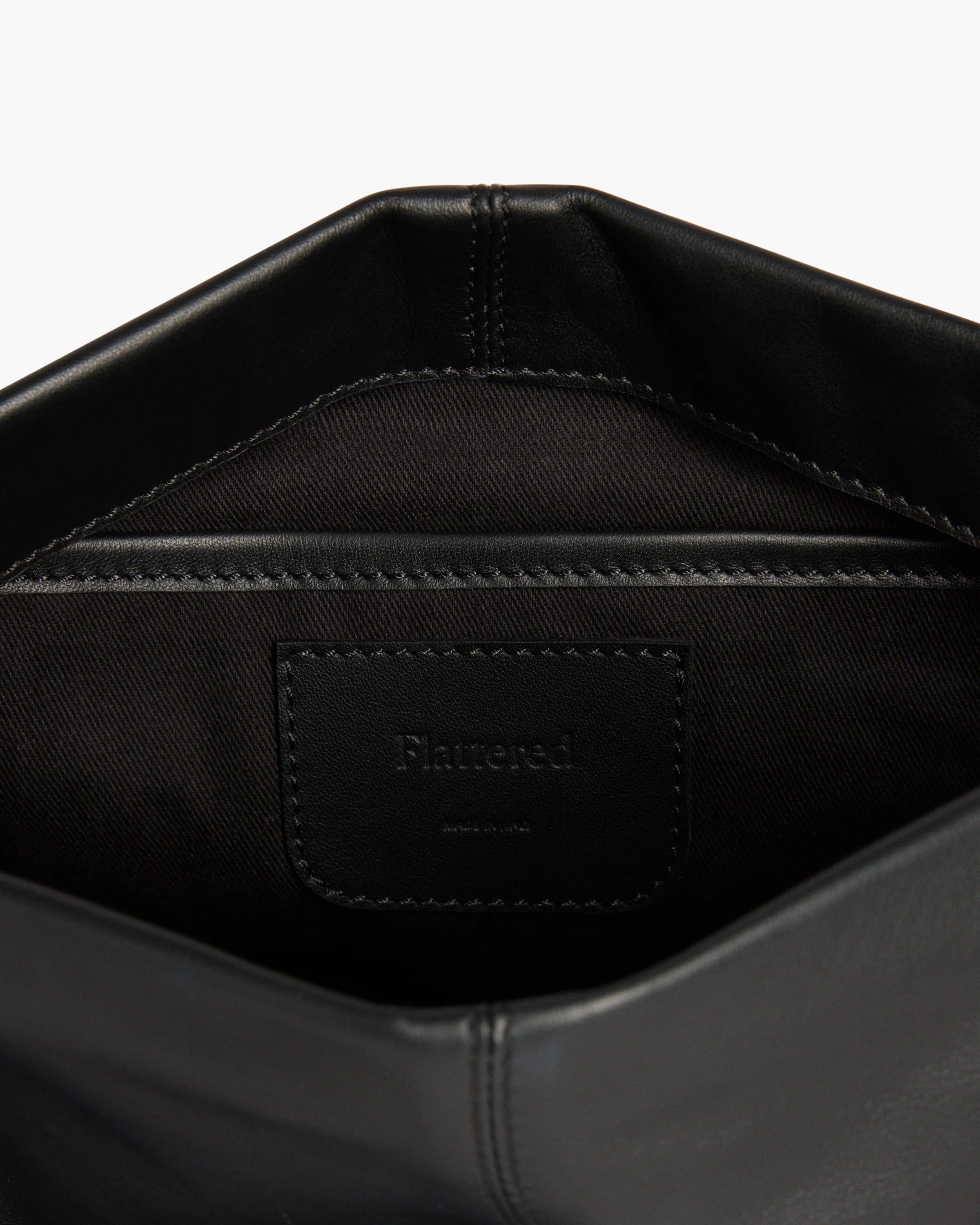 Clay Clutch in Black Leather