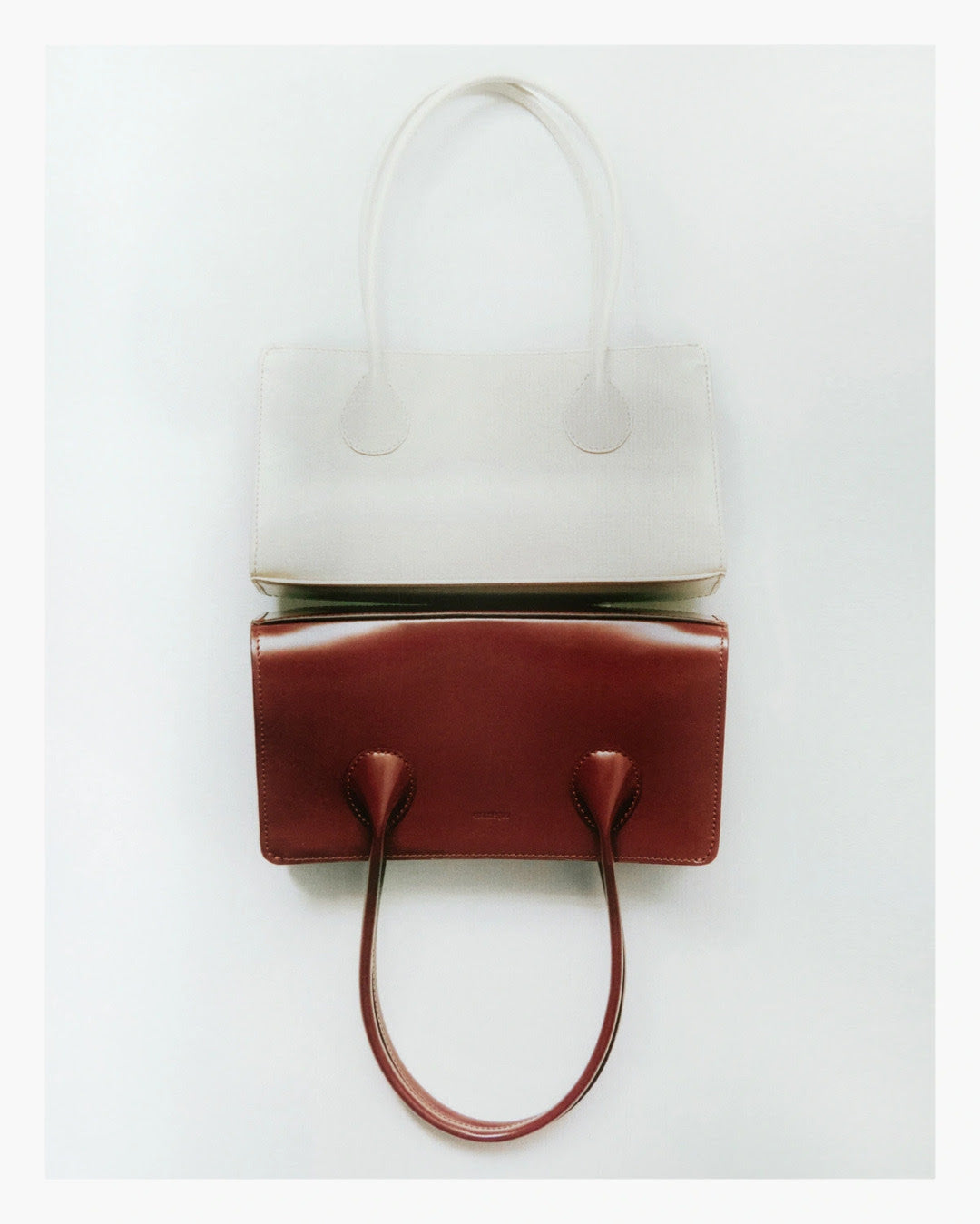 The Lou Bag in Creme Pantent Leather