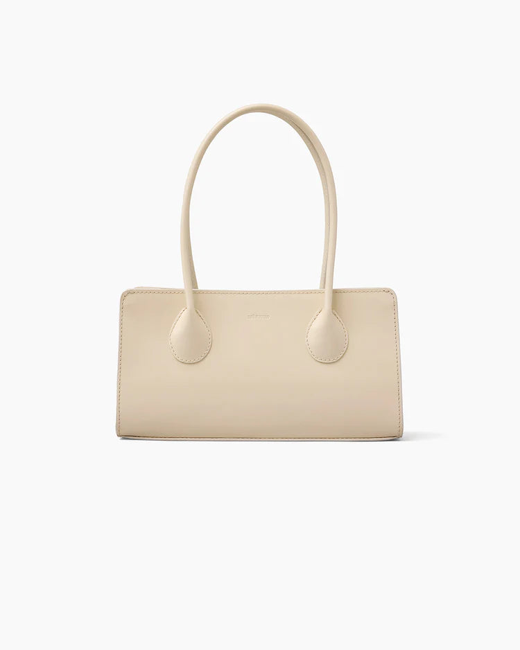 The Lou Bag in Creme Pantent Leather
