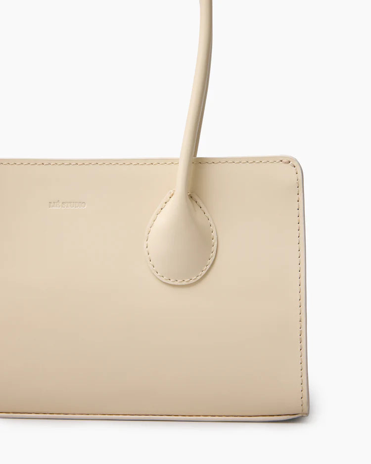 The Lou Bag in Creme Pantent Leather