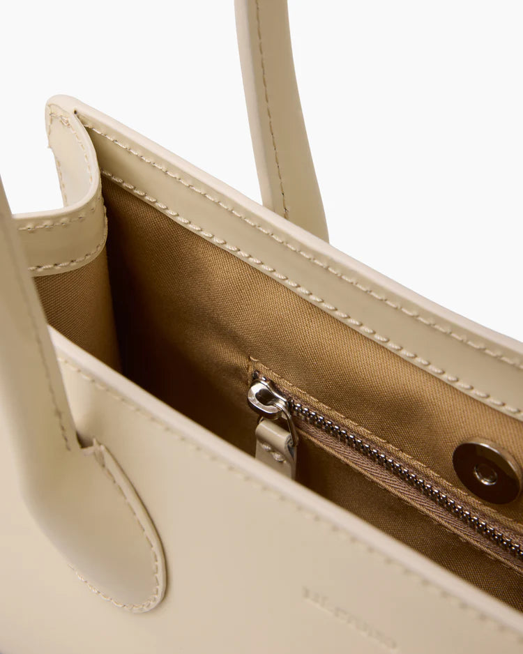 The Lou Bag in Creme Pantent Leather